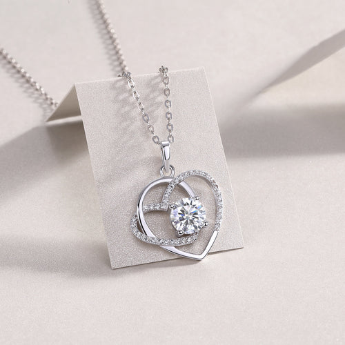 18K White Gold Intertwined Hearts Pendant Necklace with a 1 Carat round Diamond for Women